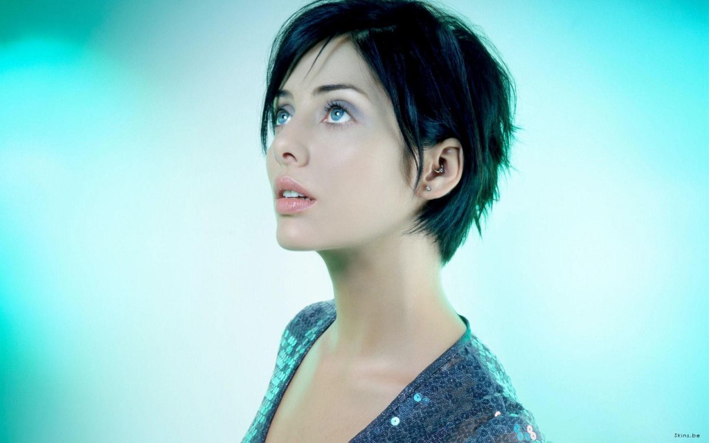 Natalie short hair blue background